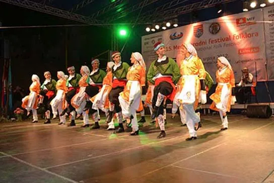 FOGEM dancers from Cyprus wearing traditional costumes and performing folk dance