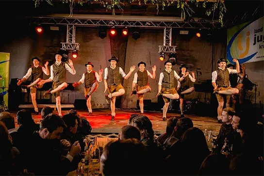 Pfarrwanger Schuhplattler dancers from Austria in traditional folk costumes